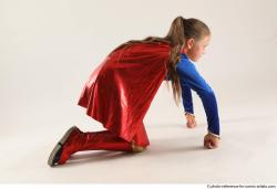 VIKY SUPERGIRL KNEELING POSE 2